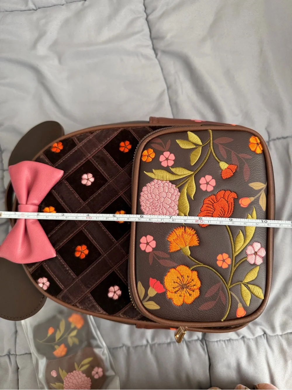 Loungefly Fall Floral Embroidered Brown Backpack with Pink Bow and applique.